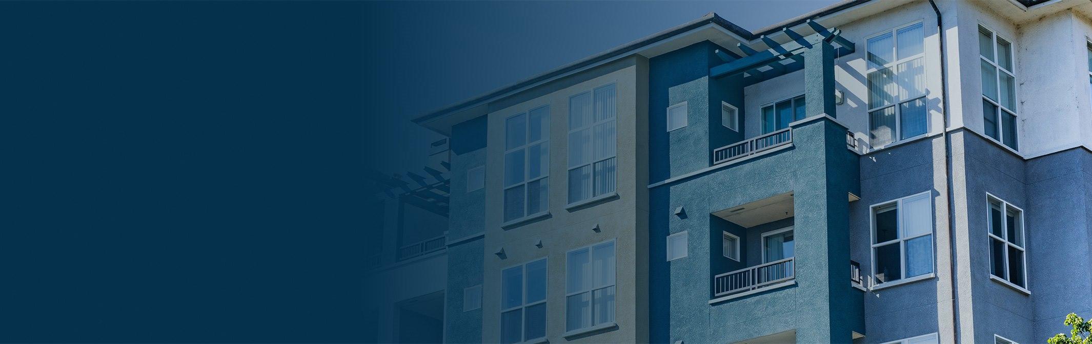 Apartment building with blue gradient overlay